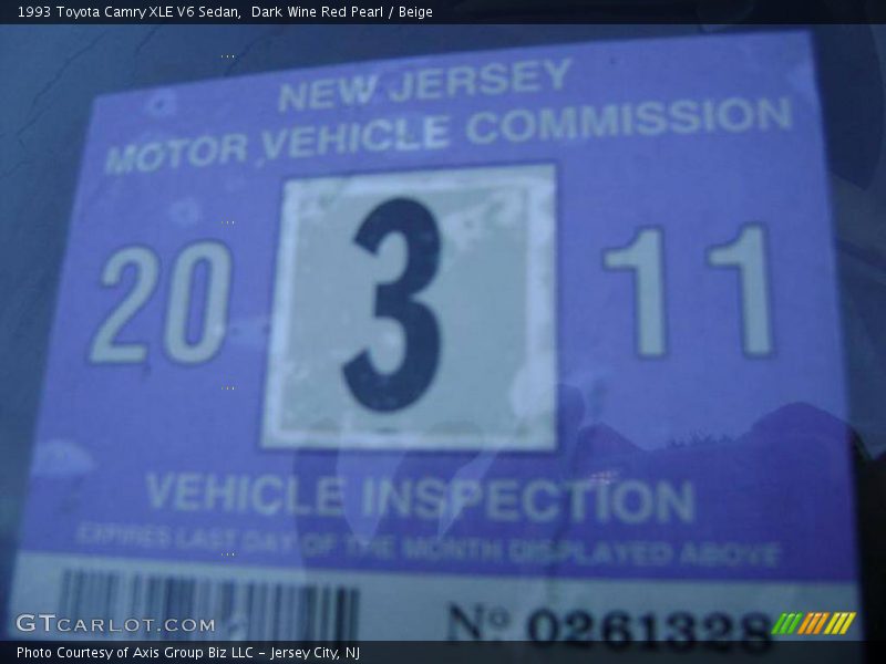 Dark Wine Red Pearl / Beige 1993 Toyota Camry XLE V6 Sedan