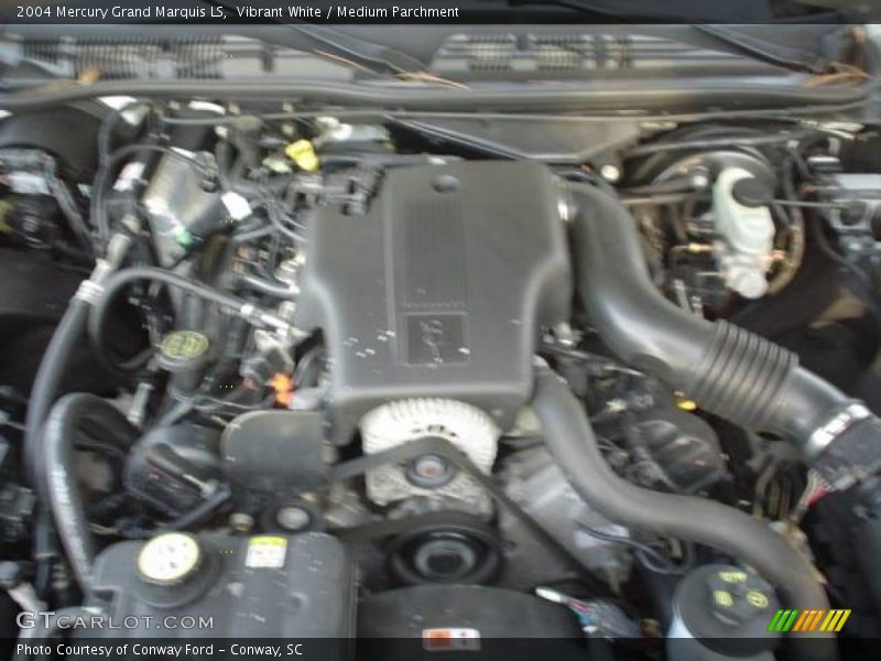 Vibrant White / Medium Parchment 2004 Mercury Grand Marquis LS