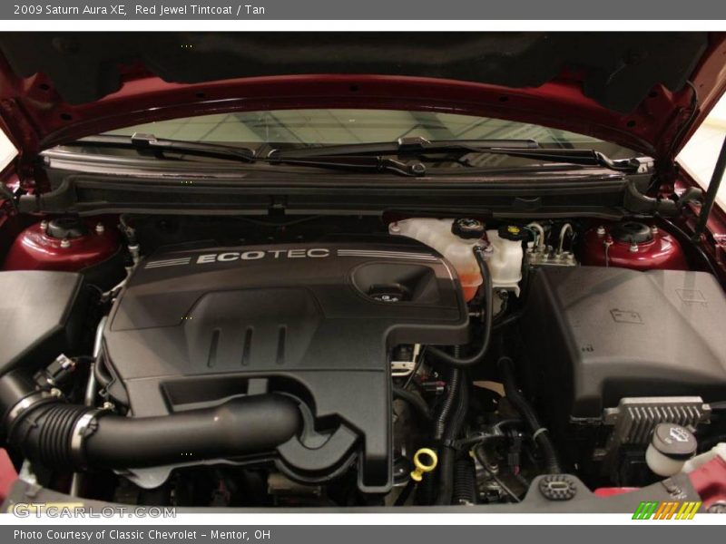 Red Jewel Tintcoat / Tan 2009 Saturn Aura XE
