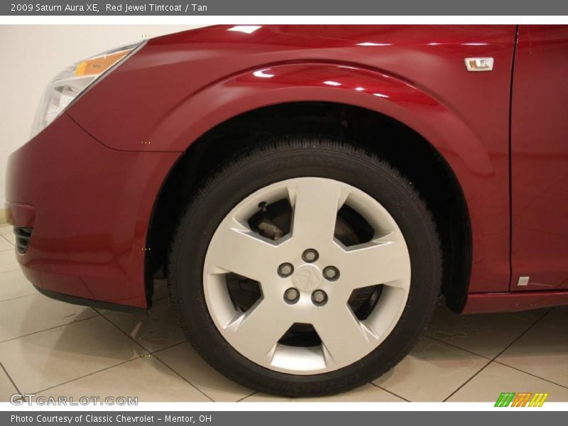 Red Jewel Tintcoat / Tan 2009 Saturn Aura XE