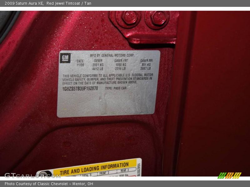 Red Jewel Tintcoat / Tan 2009 Saturn Aura XE
