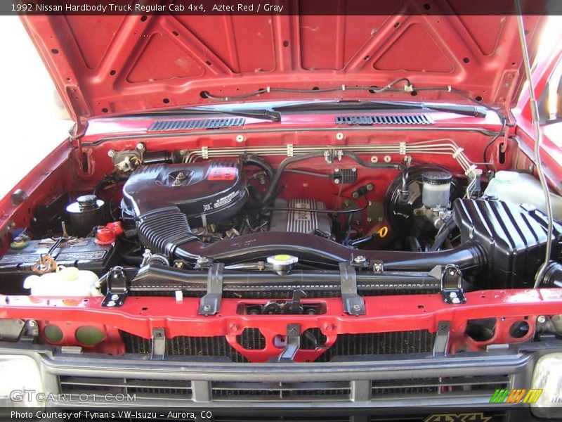 Aztec Red / Gray 1992 Nissan Hardbody Truck Regular Cab 4x4