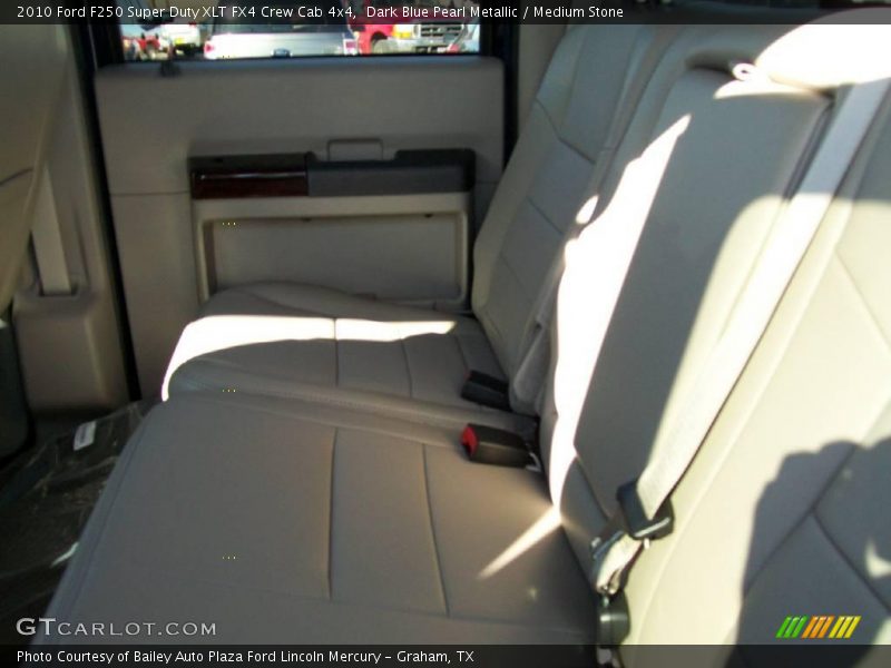 Dark Blue Pearl Metallic / Medium Stone 2010 Ford F250 Super Duty XLT FX4 Crew Cab 4x4