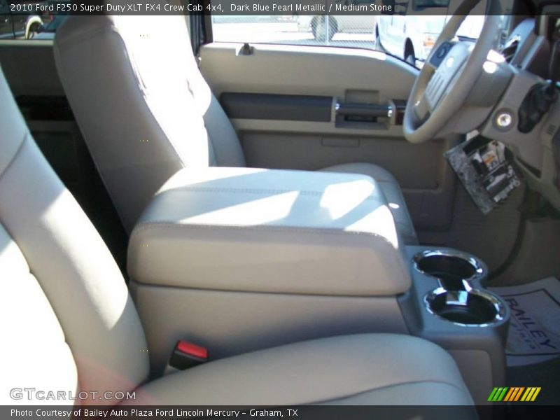 Dark Blue Pearl Metallic / Medium Stone 2010 Ford F250 Super Duty XLT FX4 Crew Cab 4x4