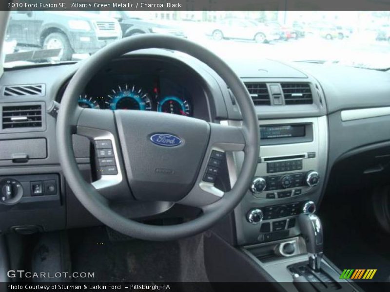 Atlantis Green Metallic / Charcoal Black 2010 Ford Fusion SE