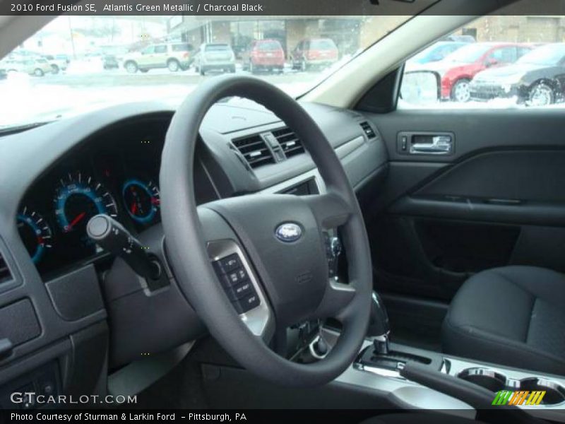 Atlantis Green Metallic / Charcoal Black 2010 Ford Fusion SE