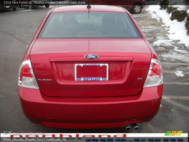 Redfire Metallic / Medium Light Stone 2009 Ford Fusion SE