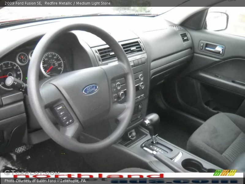 Redfire Metallic / Medium Light Stone 2009 Ford Fusion SE