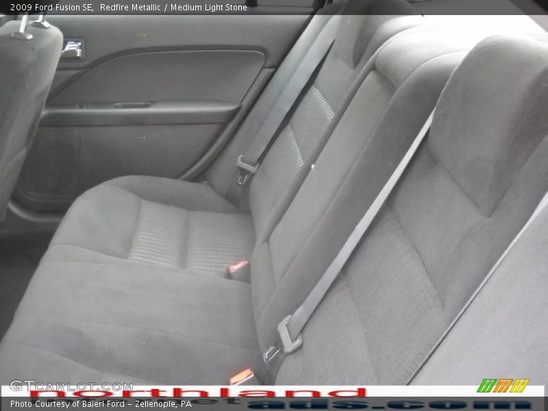 Redfire Metallic / Medium Light Stone 2009 Ford Fusion SE