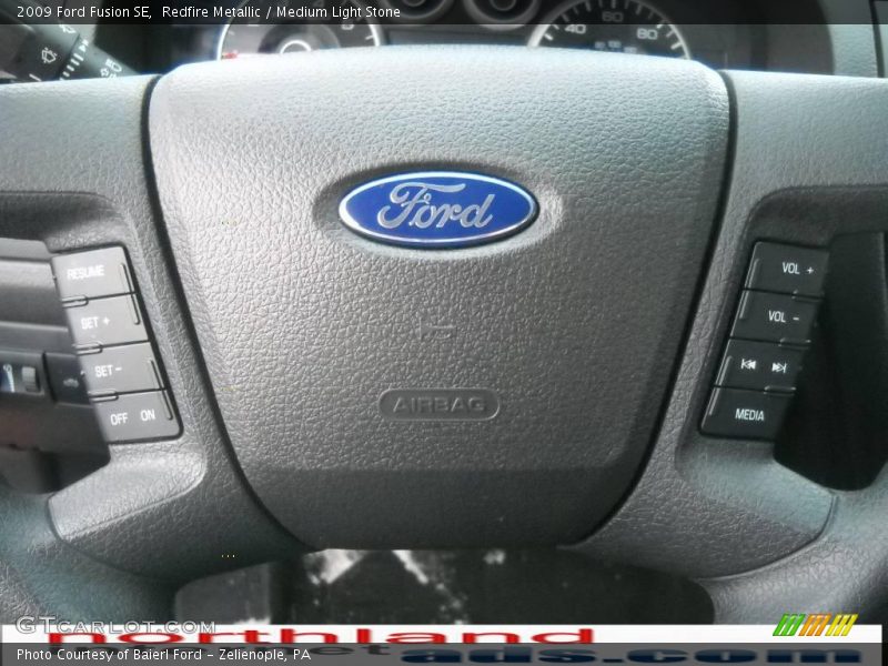 Redfire Metallic / Medium Light Stone 2009 Ford Fusion SE