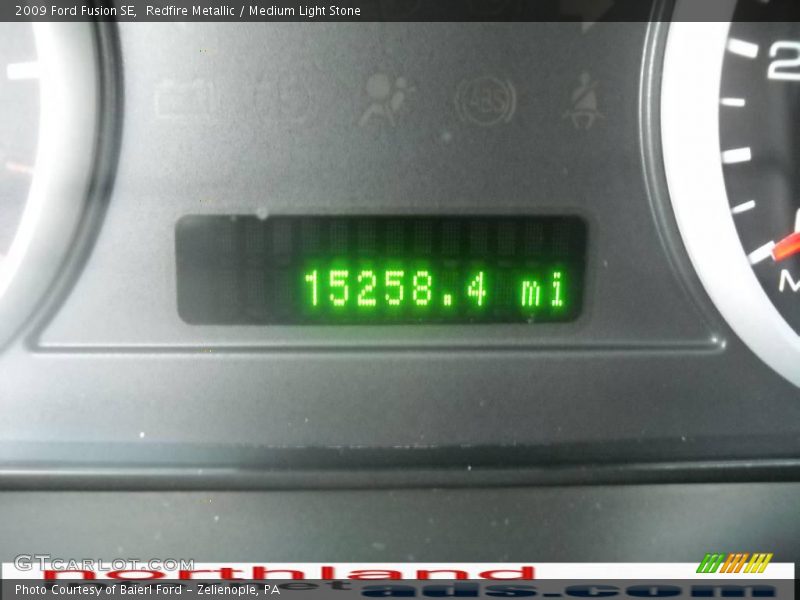 Redfire Metallic / Medium Light Stone 2009 Ford Fusion SE