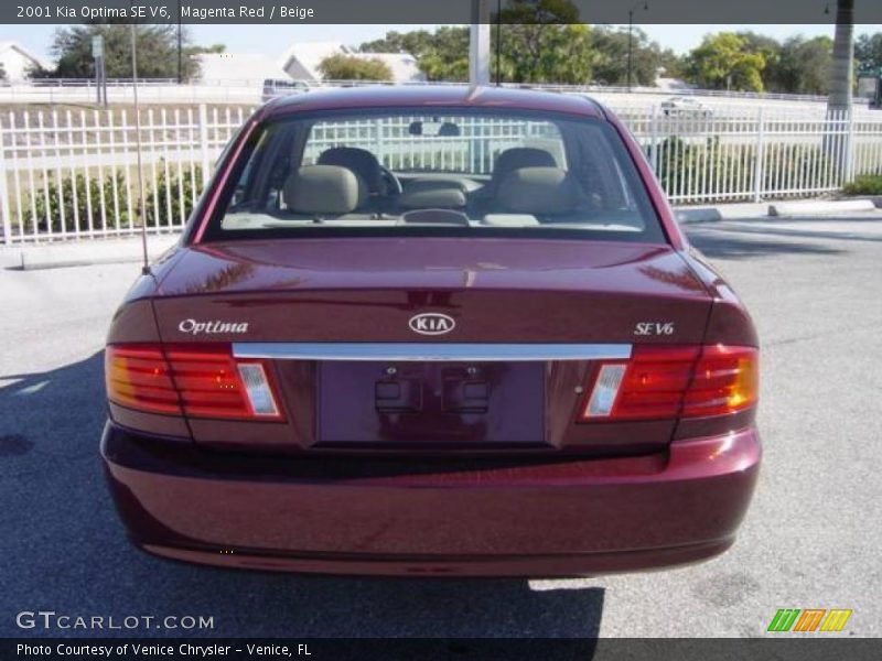 Magenta Red / Beige 2001 Kia Optima SE V6