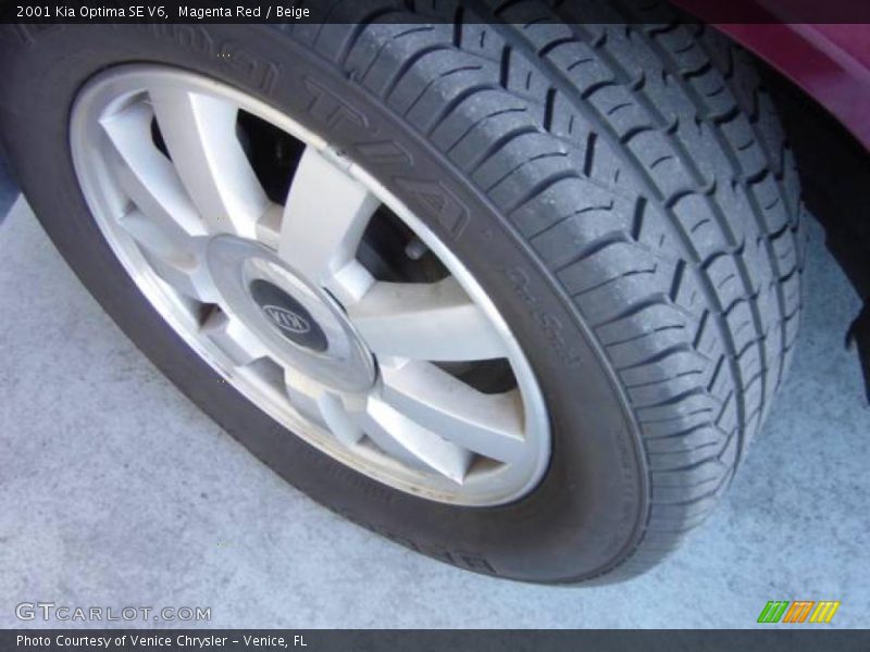 Magenta Red / Beige 2001 Kia Optima SE V6