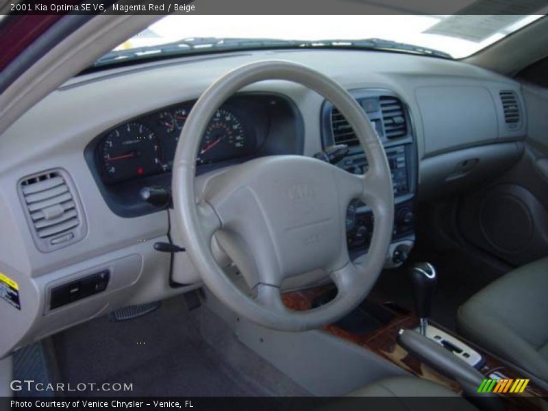Magenta Red / Beige 2001 Kia Optima SE V6