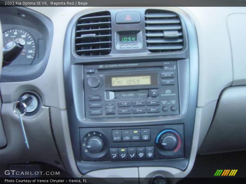 Magenta Red / Beige 2001 Kia Optima SE V6