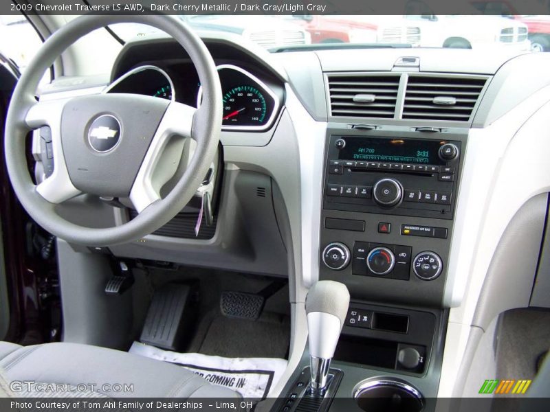 Dark Cherry Metallic / Dark Gray/Light Gray 2009 Chevrolet Traverse LS AWD