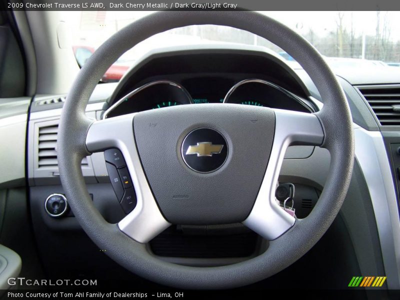 Dark Cherry Metallic / Dark Gray/Light Gray 2009 Chevrolet Traverse LS AWD