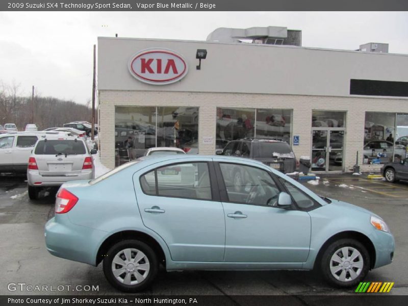 Vapor Blue Metallic / Beige 2009 Suzuki SX4 Technology Sport Sedan