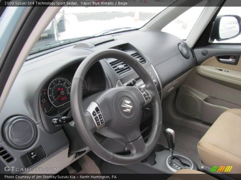 Vapor Blue Metallic / Beige 2009 Suzuki SX4 Technology Sport Sedan