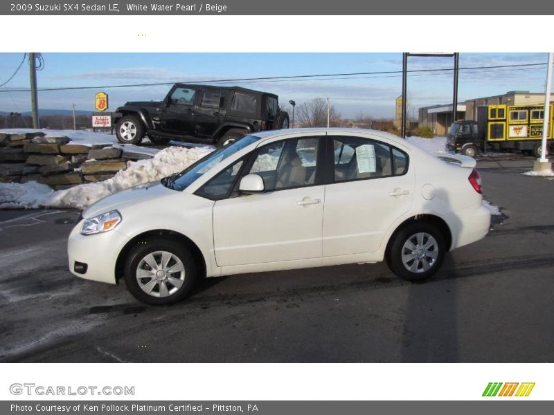 White Water Pearl / Beige 2009 Suzuki SX4 Sedan LE