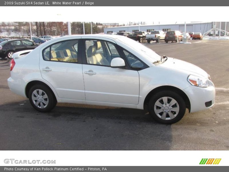 White Water Pearl / Beige 2009 Suzuki SX4 Sedan LE