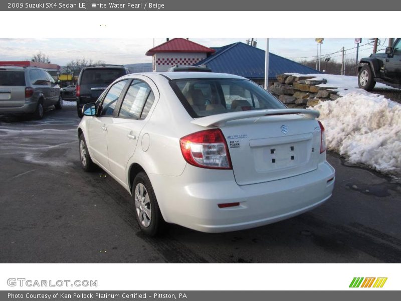 White Water Pearl / Beige 2009 Suzuki SX4 Sedan LE