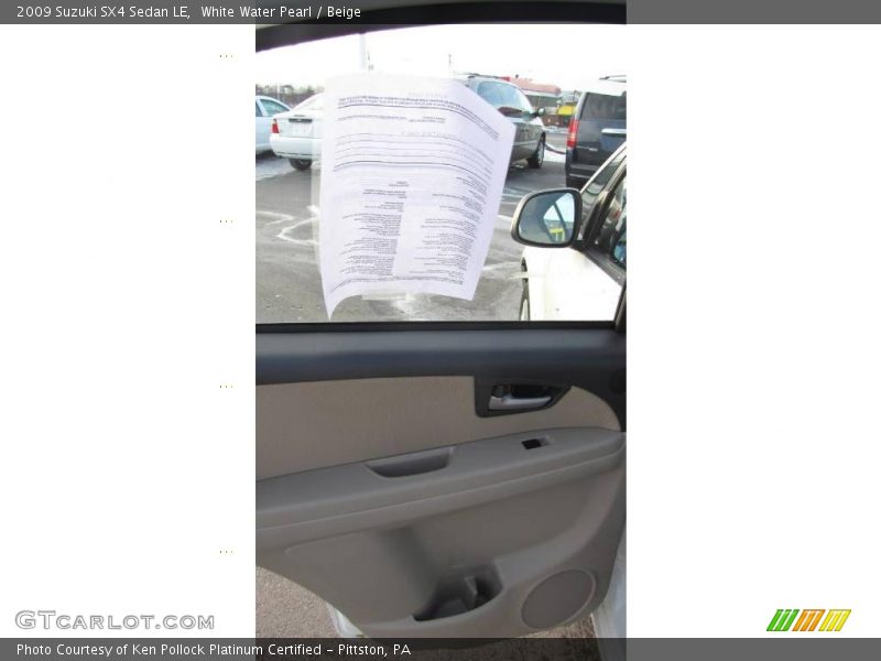 White Water Pearl / Beige 2009 Suzuki SX4 Sedan LE