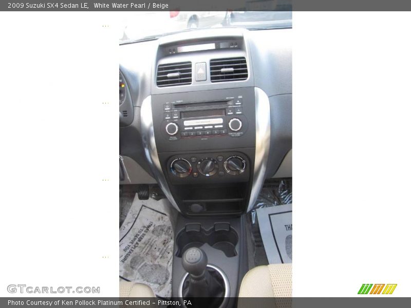 White Water Pearl / Beige 2009 Suzuki SX4 Sedan LE
