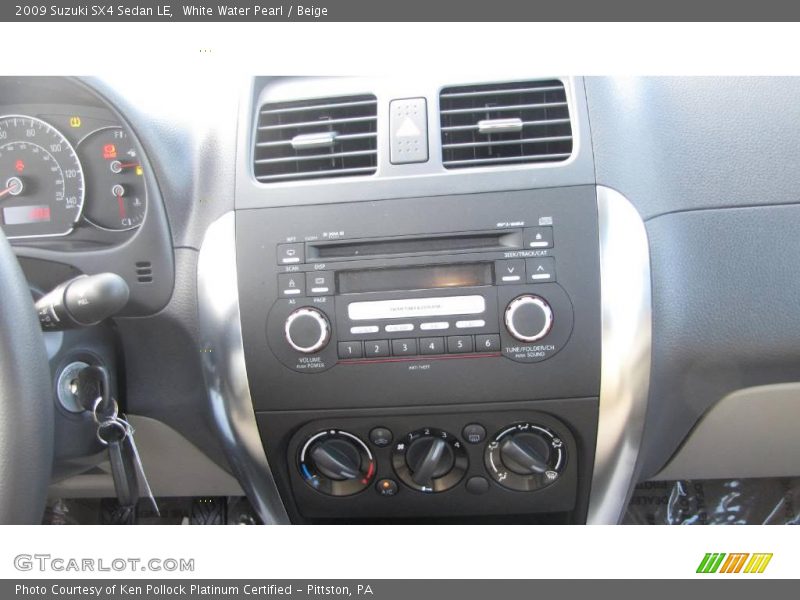 White Water Pearl / Beige 2009 Suzuki SX4 Sedan LE
