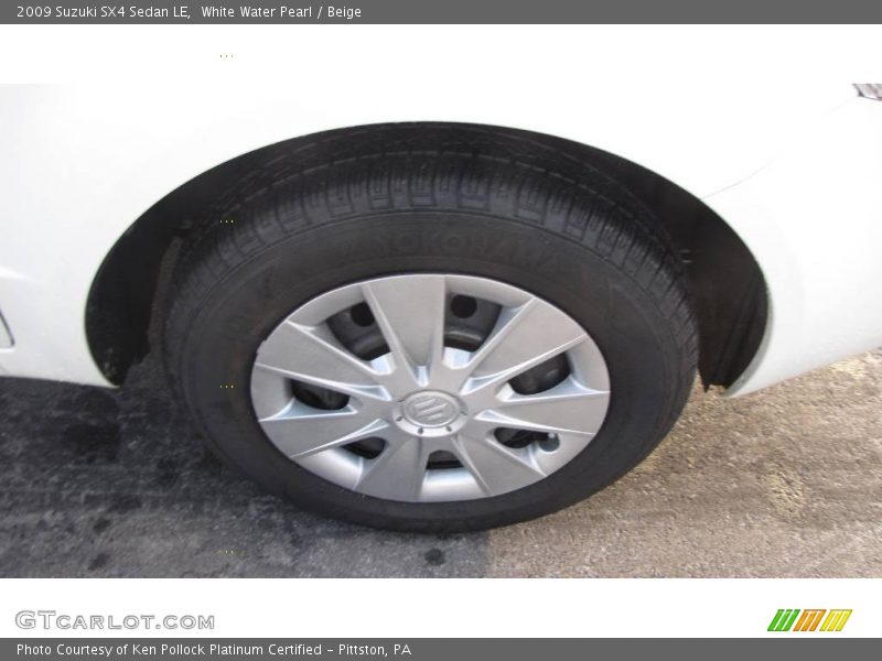 White Water Pearl / Beige 2009 Suzuki SX4 Sedan LE
