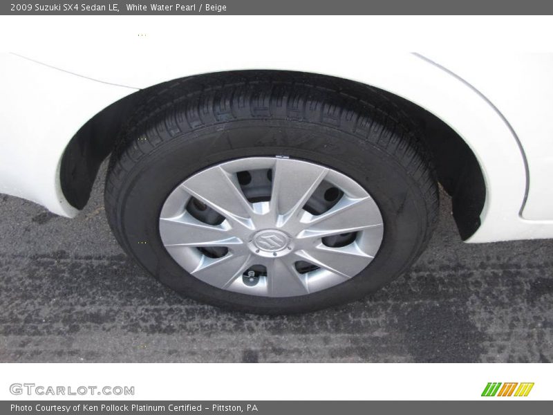 White Water Pearl / Beige 2009 Suzuki SX4 Sedan LE