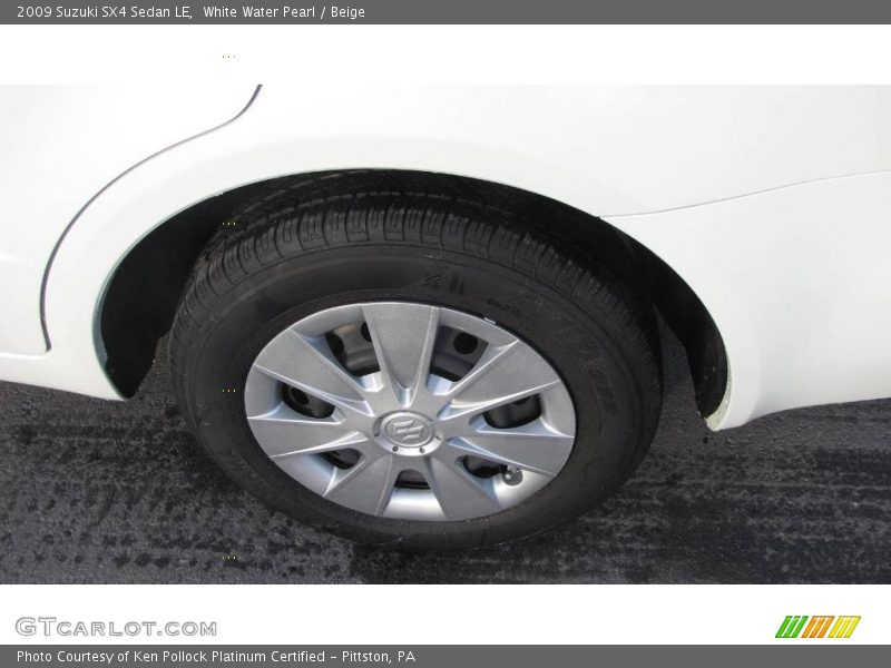 White Water Pearl / Beige 2009 Suzuki SX4 Sedan LE