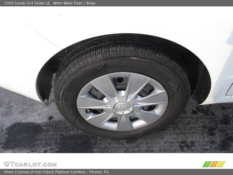 White Water Pearl / Beige 2009 Suzuki SX4 Sedan LE