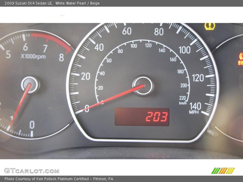 White Water Pearl / Beige 2009 Suzuki SX4 Sedan LE