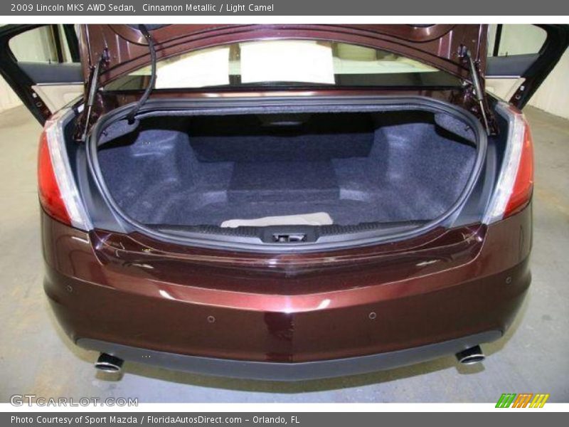 Cinnamon Metallic / Light Camel 2009 Lincoln MKS AWD Sedan