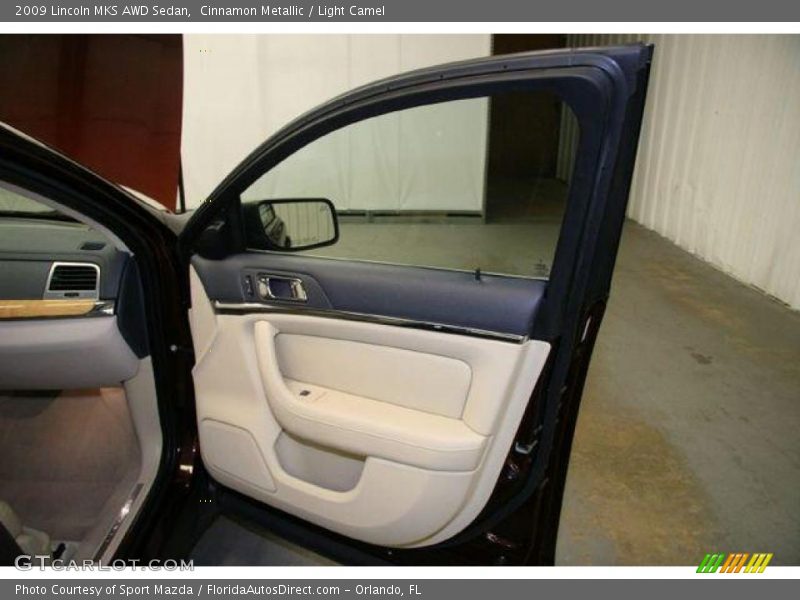 Cinnamon Metallic / Light Camel 2009 Lincoln MKS AWD Sedan