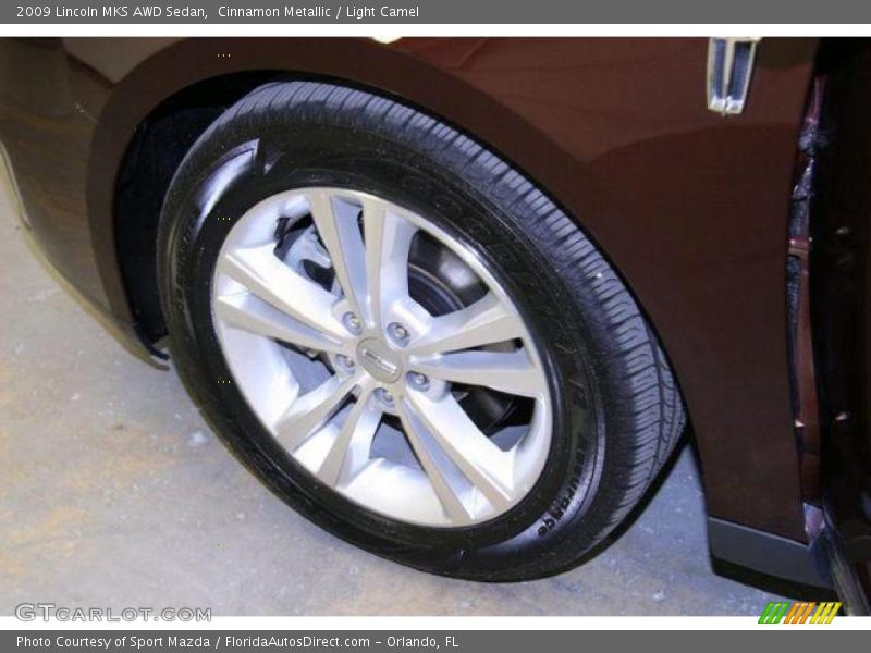 Cinnamon Metallic / Light Camel 2009 Lincoln MKS AWD Sedan