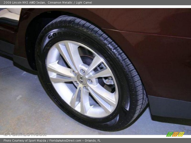 Cinnamon Metallic / Light Camel 2009 Lincoln MKS AWD Sedan