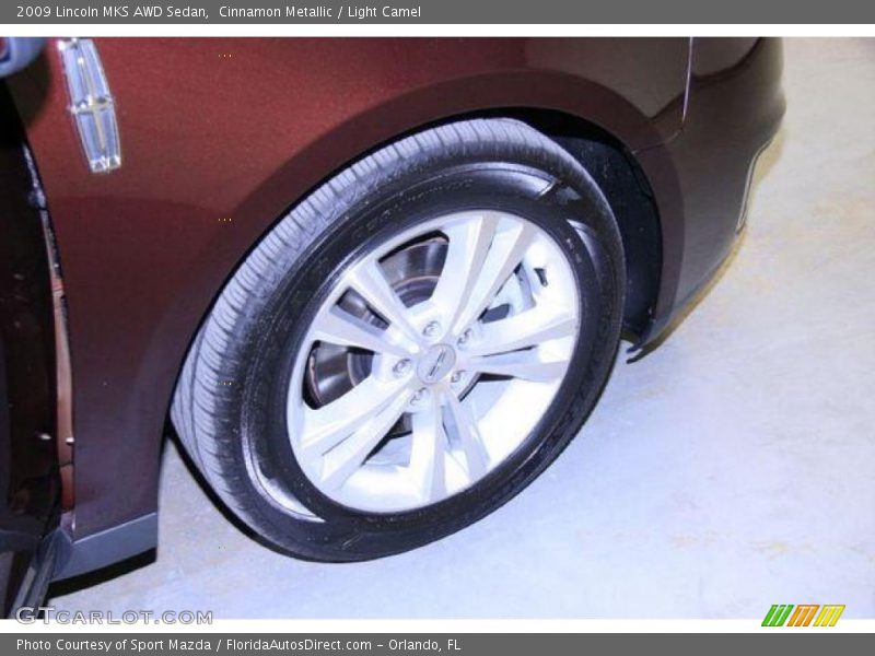Cinnamon Metallic / Light Camel 2009 Lincoln MKS AWD Sedan