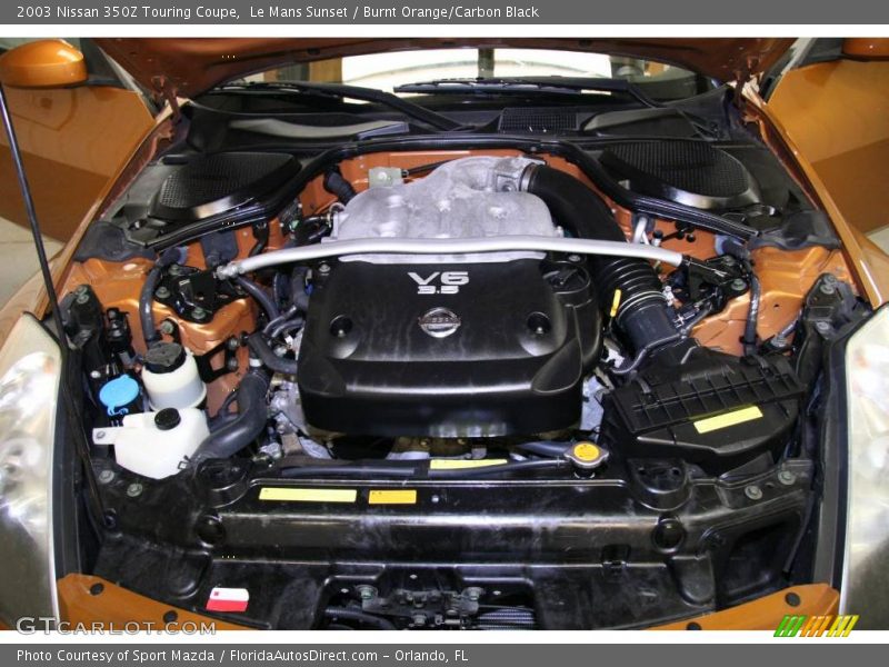 Le Mans Sunset / Burnt Orange/Carbon Black 2003 Nissan 350Z Touring Coupe