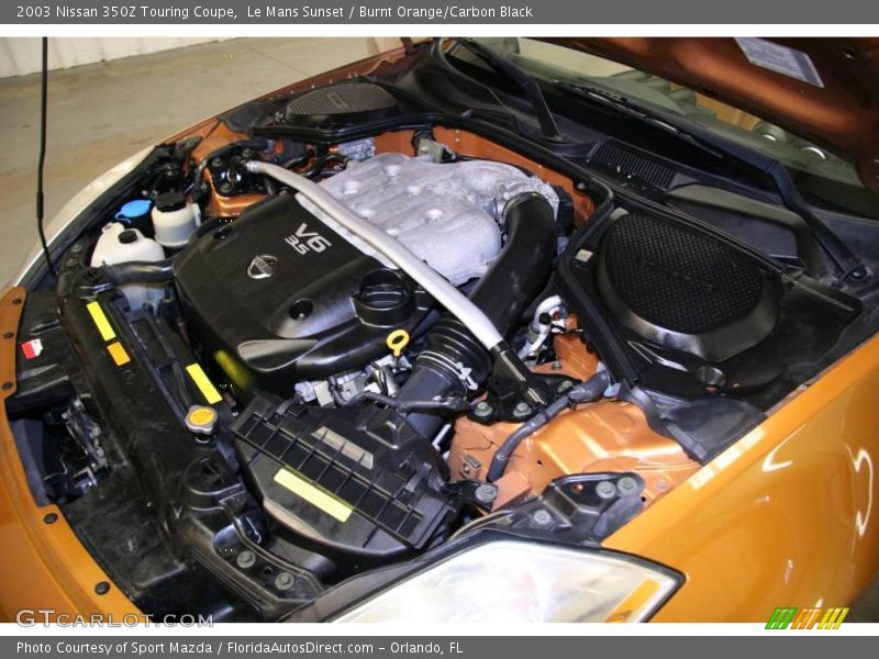 Le Mans Sunset / Burnt Orange/Carbon Black 2003 Nissan 350Z Touring Coupe
