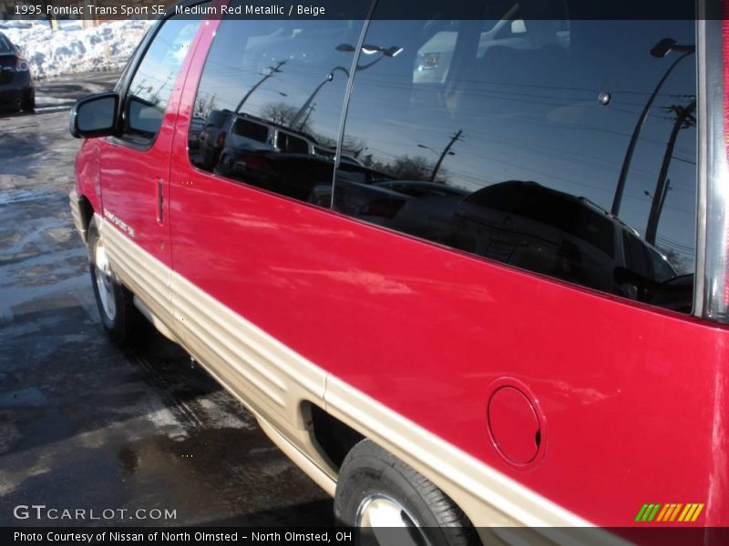 Medium Red Metallic / Beige 1995 Pontiac Trans Sport SE