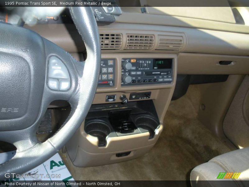Medium Red Metallic / Beige 1995 Pontiac Trans Sport SE