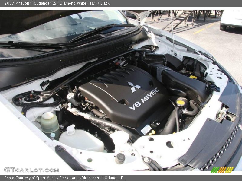 Diamond White Pearl / Black 2007 Mitsubishi Outlander ES