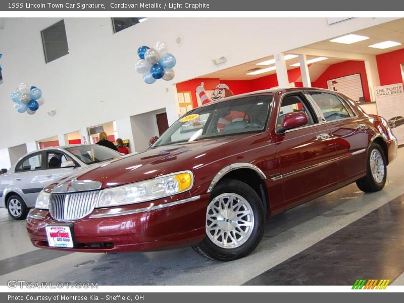 Cordovan Metallic / Light Graphite 1999 Lincoln Town Car Signature
