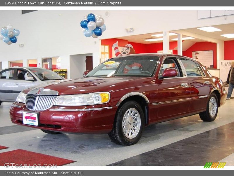 Cordovan Metallic / Light Graphite 1999 Lincoln Town Car Signature