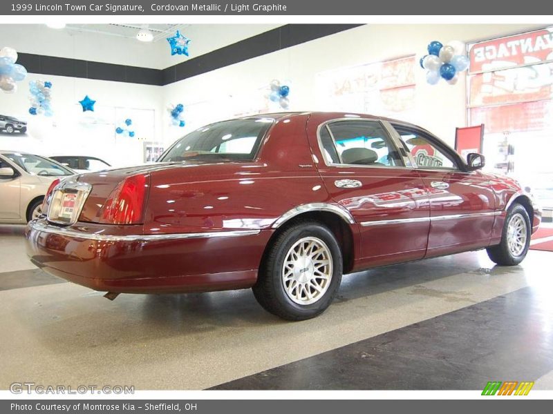 Cordovan Metallic / Light Graphite 1999 Lincoln Town Car Signature