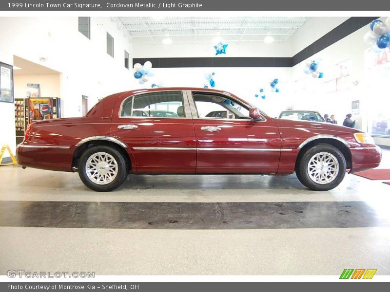 Cordovan Metallic / Light Graphite 1999 Lincoln Town Car Signature