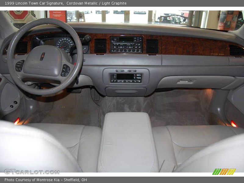 Cordovan Metallic / Light Graphite 1999 Lincoln Town Car Signature