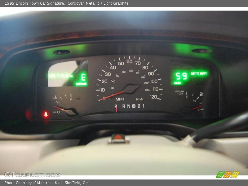 Cordovan Metallic / Light Graphite 1999 Lincoln Town Car Signature